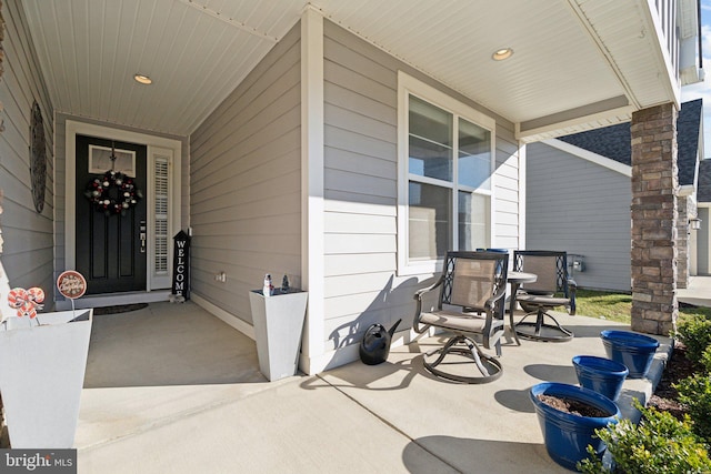 entrance to property with covered porch