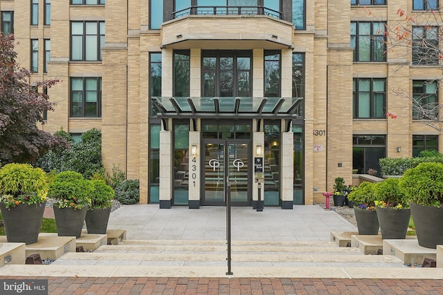 property entrance featuring french doors