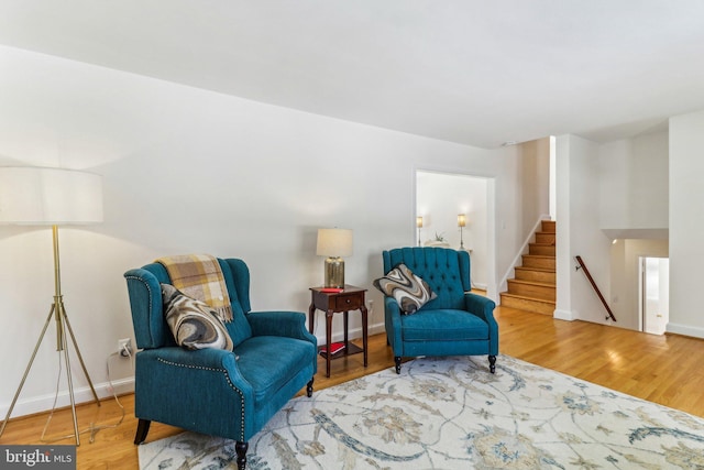 living area featuring hardwood / wood-style floors