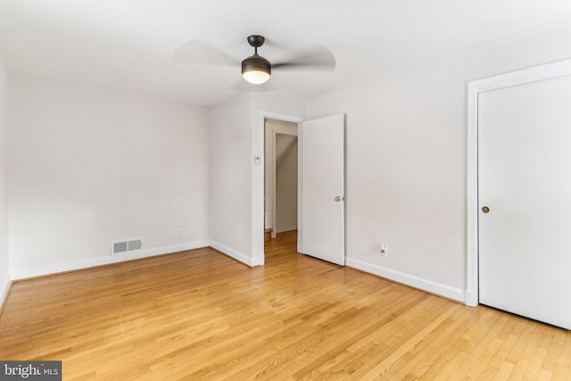 unfurnished bedroom featuring ceiling fan and light wood-type flooring