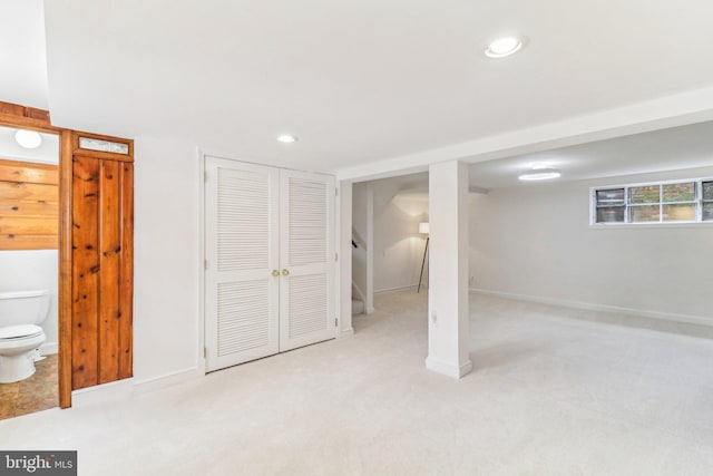 basement with light carpet