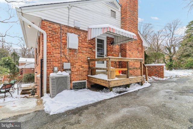 exterior space with central air condition unit