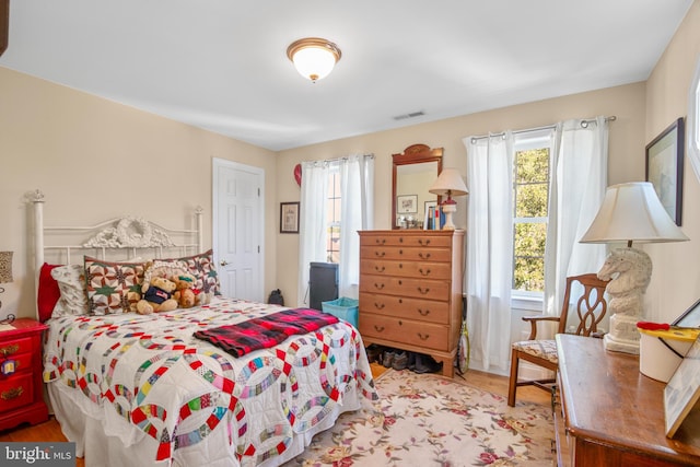 bedroom featuring hardwood / wood-style flooring