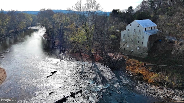 bird's eye view with a water view