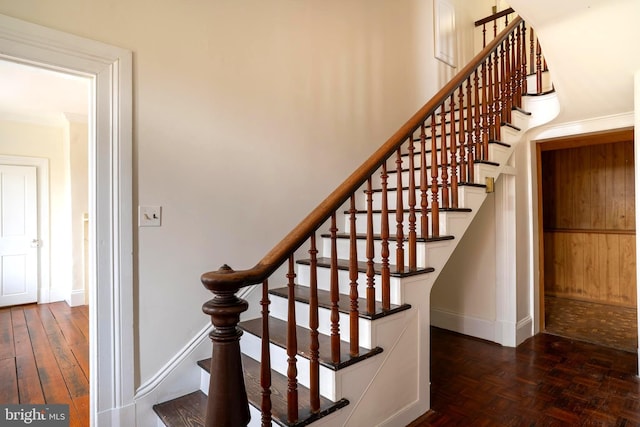 staircase with parquet floors