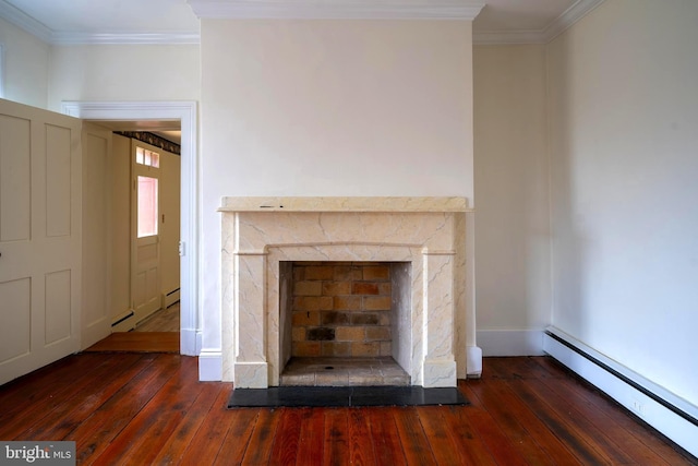 interior details featuring hardwood / wood-style floors, ornamental molding, baseboard heating, and a premium fireplace