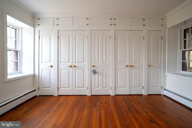 closet featuring a baseboard heating unit