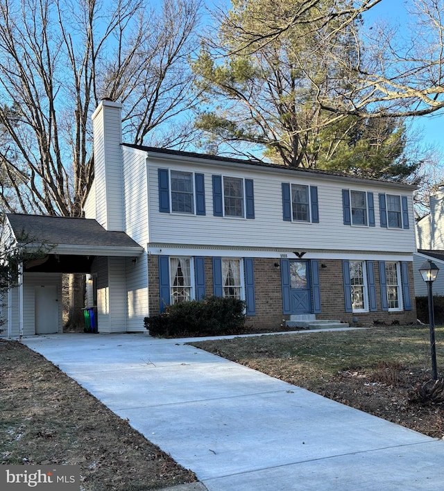 view of front facade with a carport