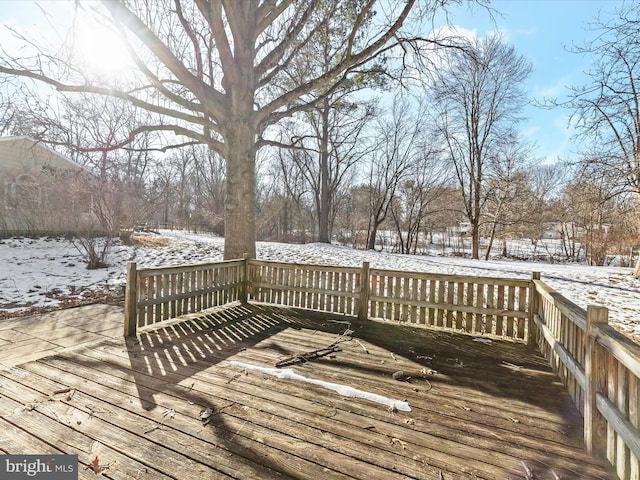 view of snow covered deck