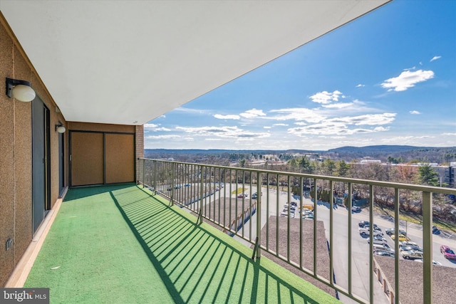 balcony featuring a mountain view