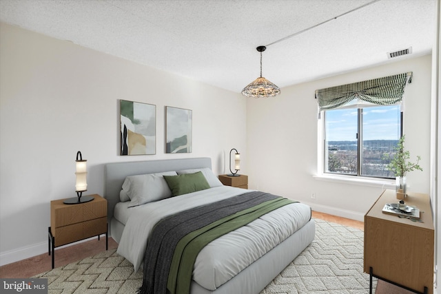 bedroom with a textured ceiling