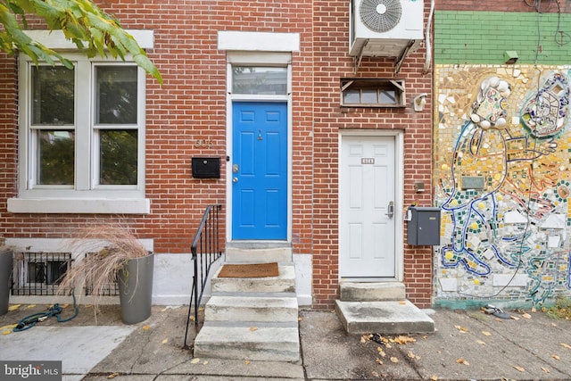 property entrance featuring ac unit