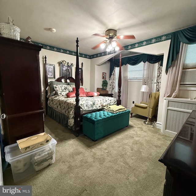 carpeted bedroom with a ceiling fan