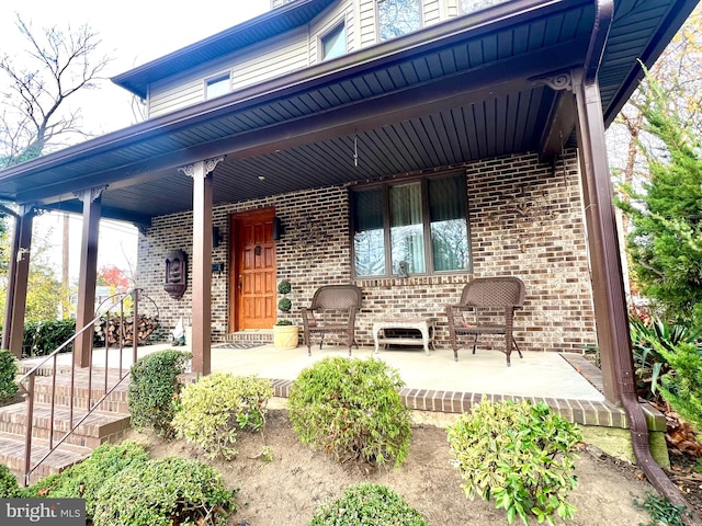 view of patio featuring a porch