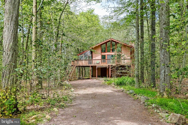 view of property with a wooden deck