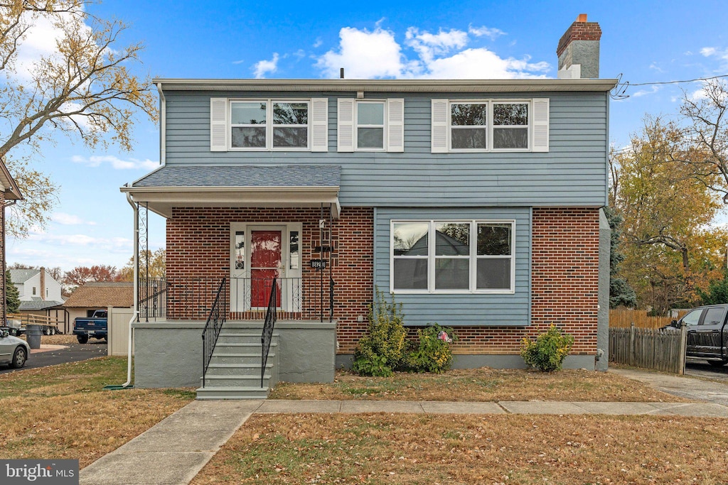 view of property with a front yard