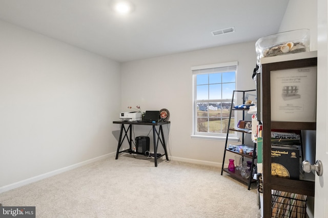 interior space featuring light colored carpet