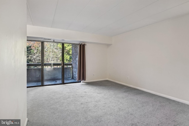 empty room featuring carpet flooring