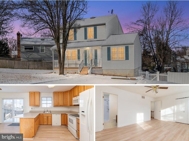 exterior space with white appliances, sink, kitchen peninsula, ceiling fan, and light hardwood / wood-style flooring