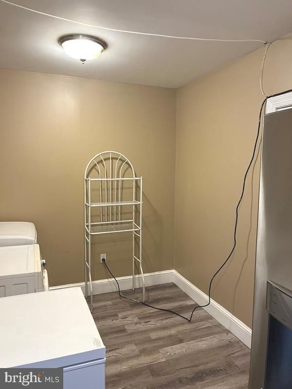 laundry room featuring dark hardwood / wood-style floors