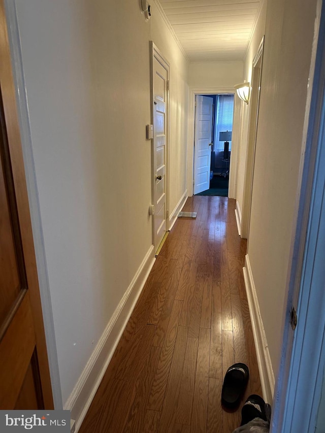 hallway featuring dark hardwood / wood-style floors