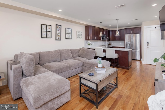 living room with light wood-type flooring