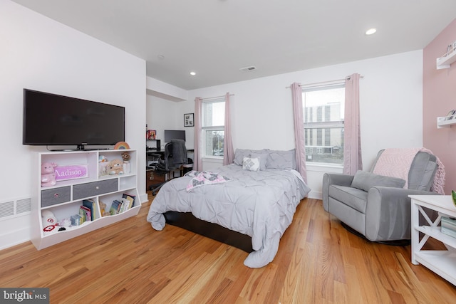 bedroom featuring wood-type flooring