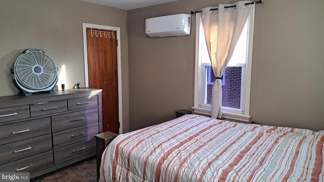 bedroom featuring a wall mounted air conditioner