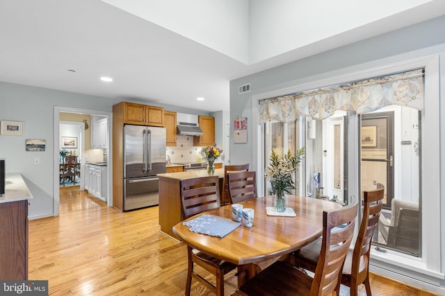 dining area featuring light hardwood / wood-style floors