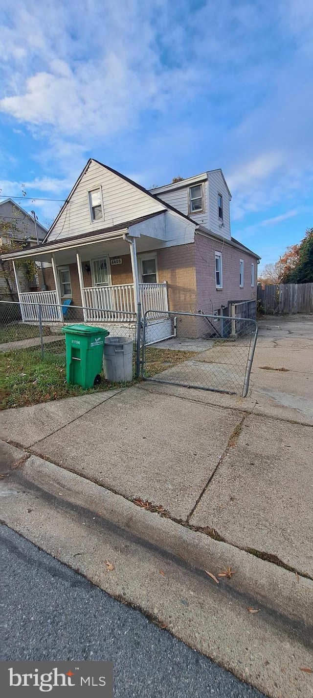 view of front of home featuring covered porch