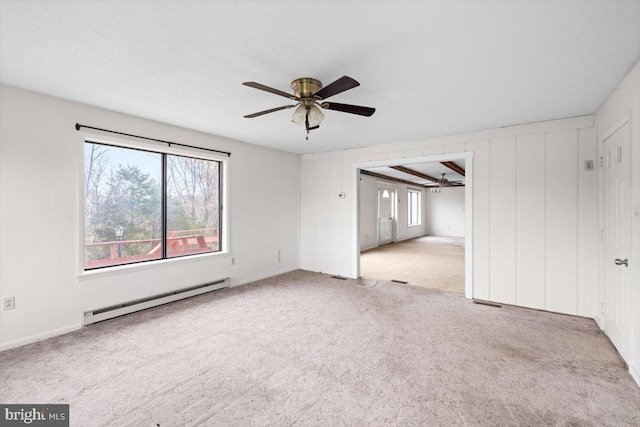 empty room featuring light carpet, ceiling fan, and a baseboard heating unit