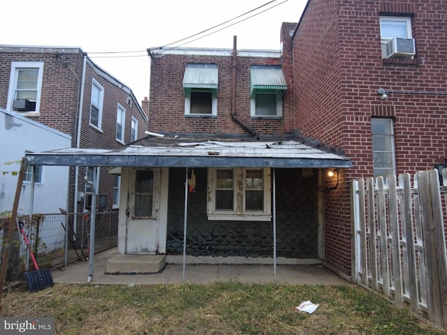 view of front facade with cooling unit