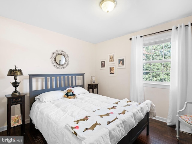 bedroom featuring dark hardwood / wood-style floors