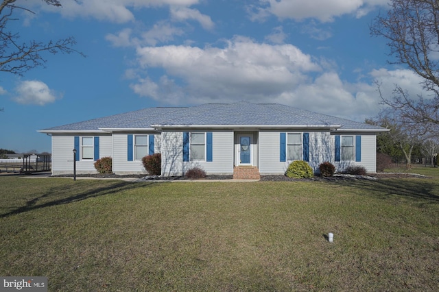 ranch-style house with a front yard