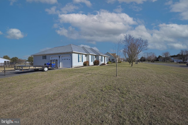 view of yard featuring a garage