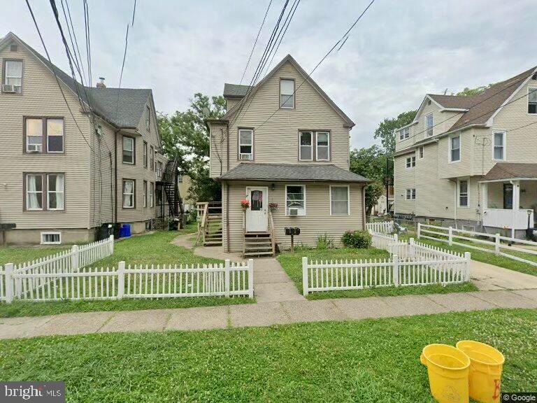 157 Cooper Ave, Oaklyn, NJ 08107 - view of front facade with a fenced front yard