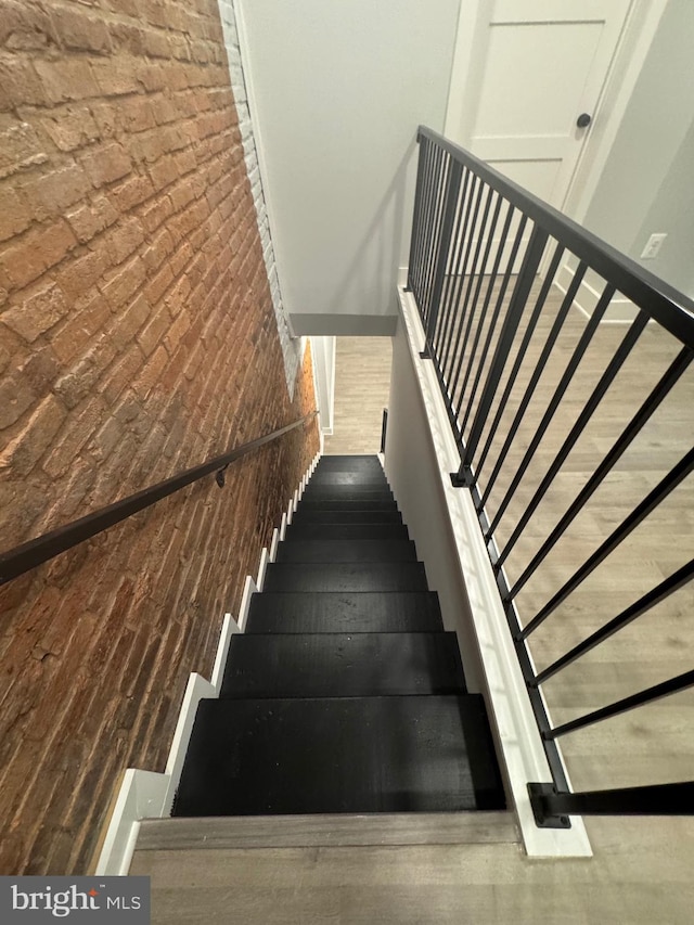 stairs with brick wall