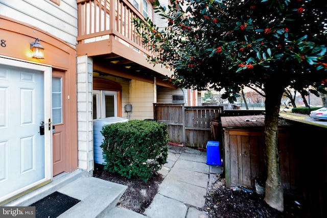 property entrance with a balcony