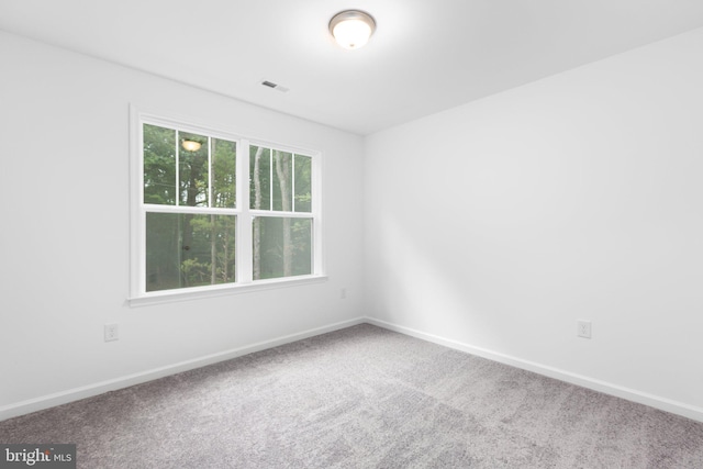 empty room with carpet floors