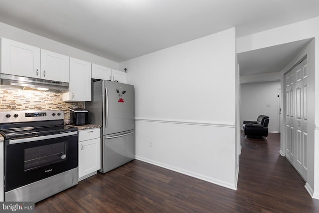 kitchen with white cabinets, appliances with stainless steel finishes, decorative backsplash, and dark wood-type flooring