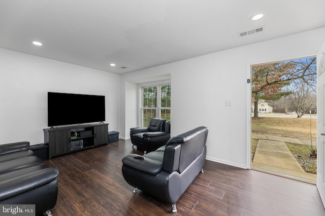 living room with dark hardwood / wood-style floors