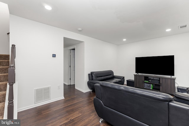 living room featuring dark hardwood / wood-style flooring