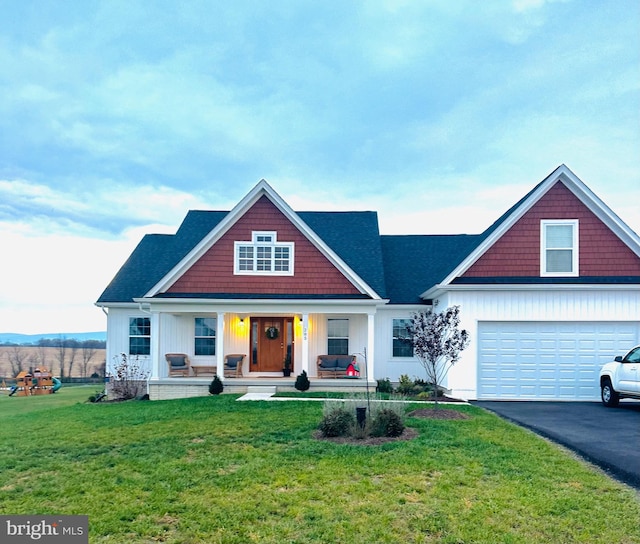 view of front of house featuring a porch and a front lawn