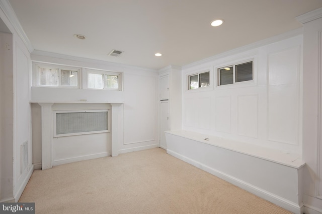 526 Powhatan Pl NW, Washington, DC 20011 - unfurnished living room featuring light carpet, crown molding, and recessed lighting