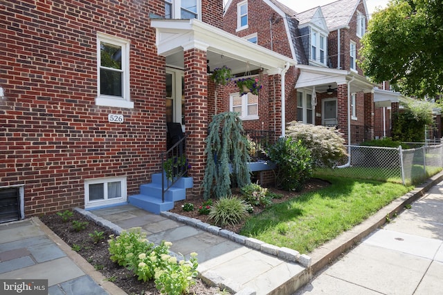 526 Powhatan Pl NW, Washington, DC 20011 - view of home's exterior with brick siding and a ceiling fan