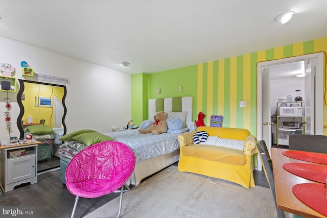 bedroom featuring hardwood / wood-style flooring