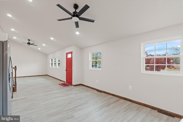 entryway featuring light hardwood / wood-style flooring, ceiling fan, and lofted ceiling