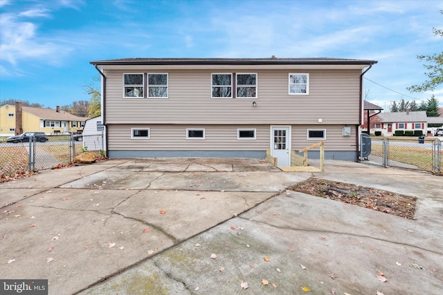 back of property featuring a patio area