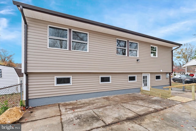 back of property with a patio area