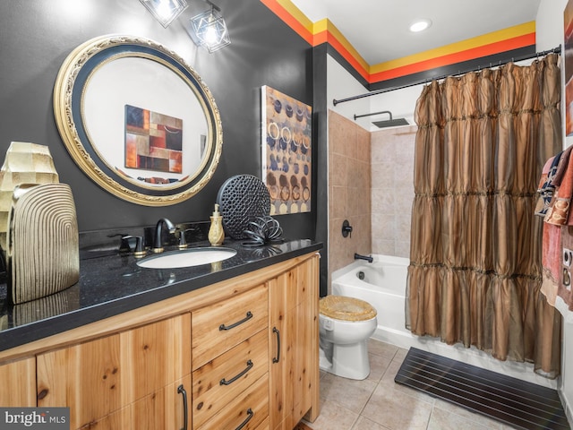 full bathroom with tile patterned floors, shower / bath combination with curtain, toilet, and vanity